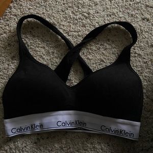 CK black bra, never worn, crosses in back